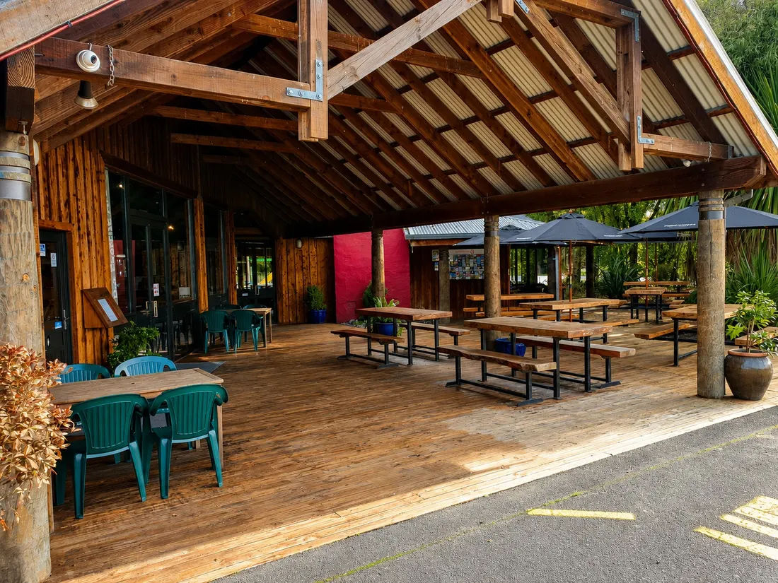 The covered deck with picnic tables